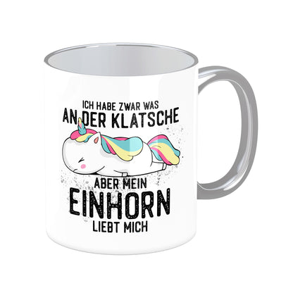 Tasse mit Spruch: Ich habe zwar was an der Klatsche, aber mein Einhorn liebt mich